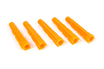 Construction dowels on a white background