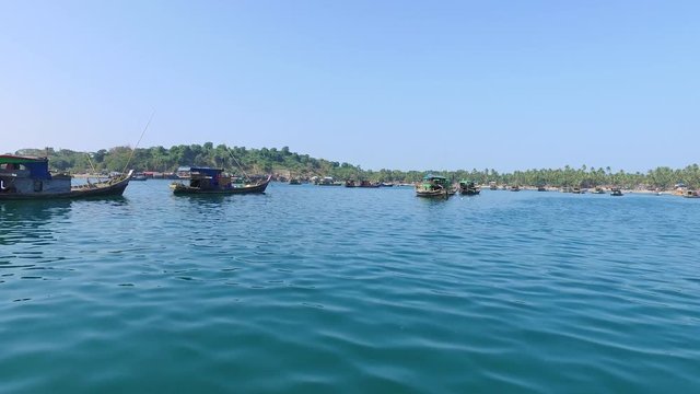 Gyeiktaw village.Ride with boat along fishing village and fishermen's boats at Ngapali Beach in Myanmar. 