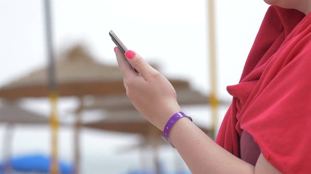 High quality video of woman using mobile phone in 4K