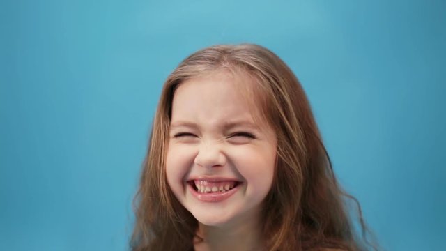 little cheerful girl laught