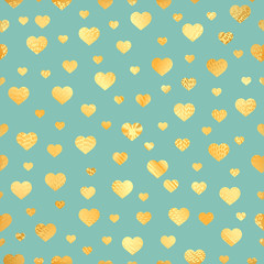Seamless pattern with gold foil hearts.