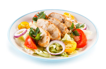 Fototapeta na wymiar Green salad with grilled chicken fillet