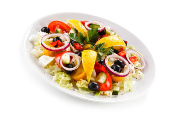 Greek salad on white background