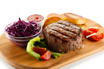 Grilled steak with roasted potatoes and vegetables