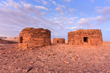 Ancient tombs at sunset in the desert