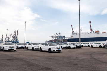 Fototapeta na wymiar New Cars in Commercial Port