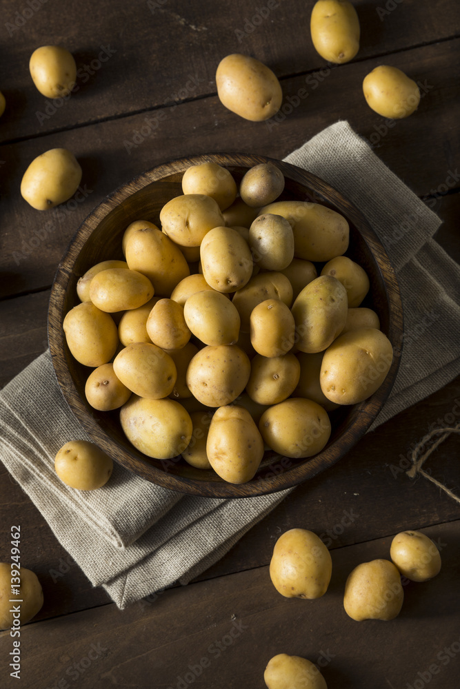 Poster raw organic baby gold potatoes