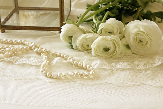 white delicate lace fabric and flowers