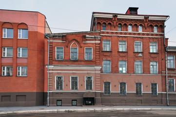 Ancient red brick building on the street of Minsk.