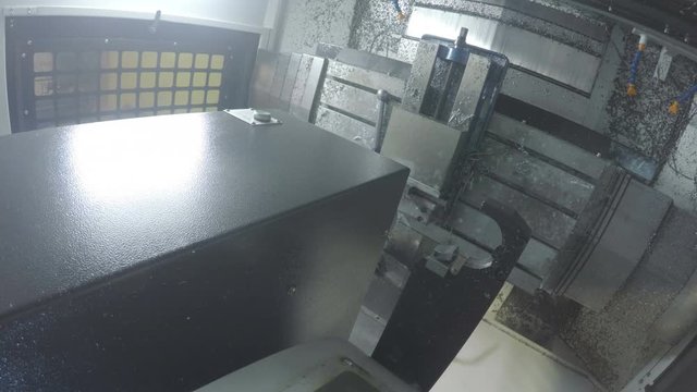 Camera Moves along Machine at the Heavy Idustry Factory