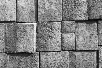 Stone wall design as mortar background texture in black and white