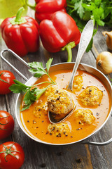 Meatball soup with  paprika