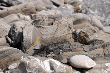 Organic curve laminate structure of stone close up.
