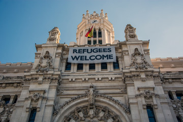 Madrid City Hall showing a banner supporting refugees
