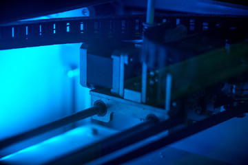 Working with 3D printer in the laboratory and studying technology. Printer is heating up. Macro...