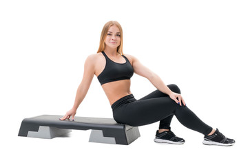 Step fitness trainer with stepper at studio