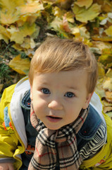 Fototapeta premium Portrait of a boy with a scarf around his neck