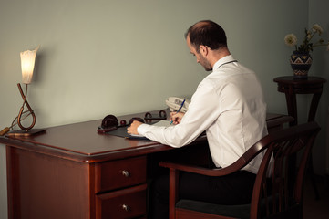 young business man working at table