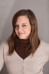 Fototapeta premium Portrait of beautiful and cheerful smiling girl