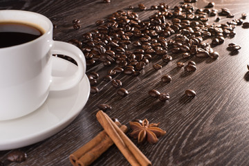 Coffee cup with coffee beans and chicory