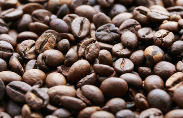 the background of the many fragrant  roasted coffee beans