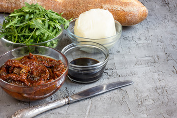 ingredients for brushetta with Sun-dried tomatoes