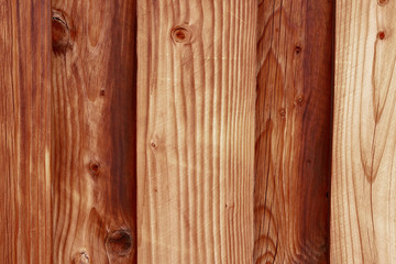 Vertical wood boards on a fence
