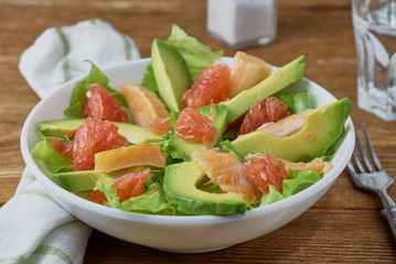 Smoked salmon salad, with greens, avocad and grapefruit.