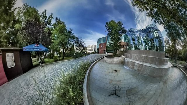 360Vr Video Sunset on Square at Philharmonia Modern Building Made of Glass Panels Park Fountain Sights of Opole Link of Times Old and Modern Structures