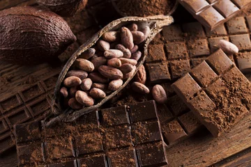 Foto op Plexiglas Chocolate bar, candy sweet, dessert food on wooden background © Sebastian Duda