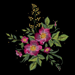 Embroidery colorful floral pattern with vinous dog roses. Vector traditional fashion flowers ornament on black background for design.