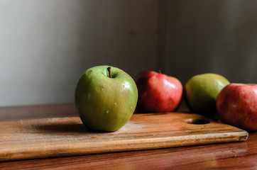 Still life of apples on a table