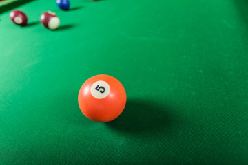 Snooker ball on billiard table