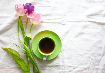 sweets,tablet and tulips.  Women's day, Mother's Day.
