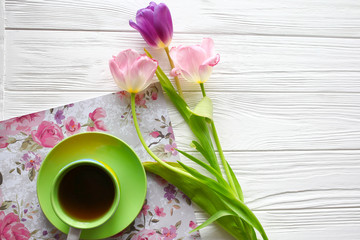 tea cup and tulips.  Women's day, Mother's Day.