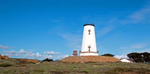 Fototapeta na wymiar Lighthouse at Piedras Blancas point on the Central California Coast north of San Simeon California USA