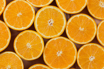 Sliced oranges as a background.