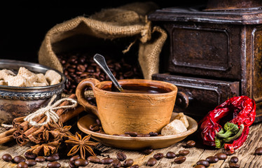 Coffee cup and saucer on a wooden table.