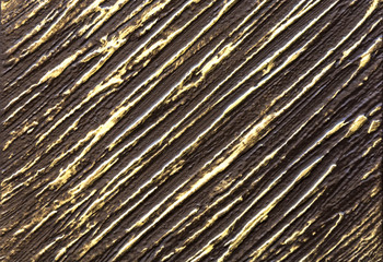 Obraz premium Unusual pattern of dark wall with Golden stripes
