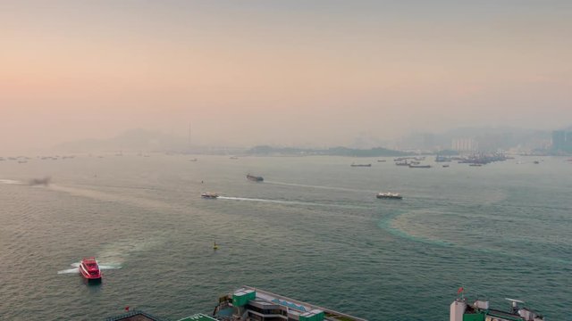 sunset light hong kong city victoria harbour traffic panorama 4k time lapse china

