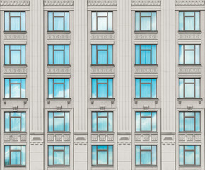 690504 Facade of a modern concrete building with windows