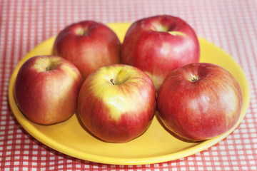 red apples in plate