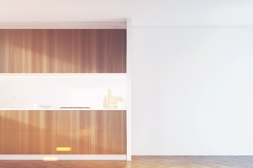 Fototapeta premium Dark wood kitchen with white wall, toned