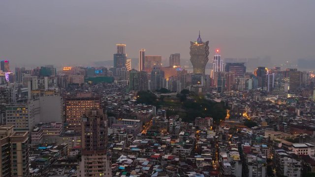 sunset famous macau city grand lisboa center hotel rooftop panorama 4k time lapse china
