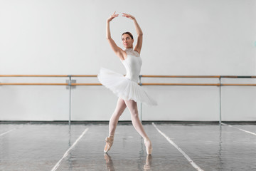 Beautiful ballerina rehearsal in ballet class - obrazy, fototapety, plakaty