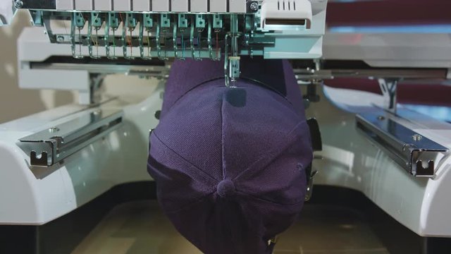 Embroidery machine deals logo on the cap dolly shoot
