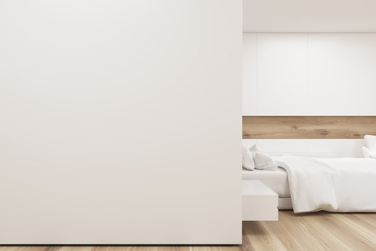 Bedroom with poster gallery, white wall, closeup
