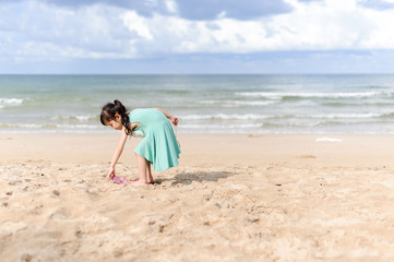 Young little girl on the beach