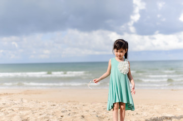 Young little girl on the beach