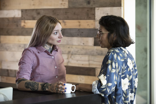 Women chatting during coffee break